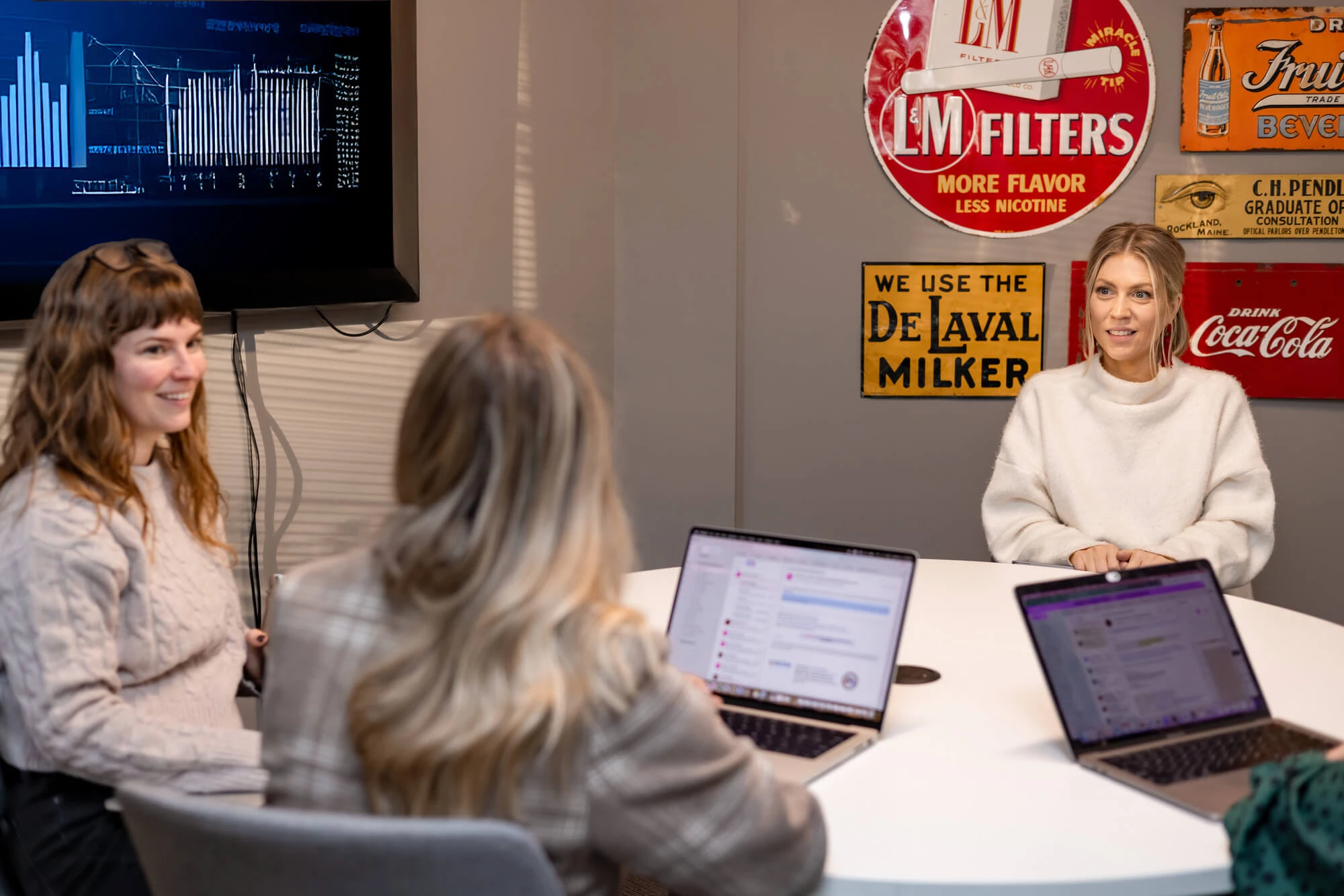 Erika, Julia and Jenn in a meeting - Trainman Photography